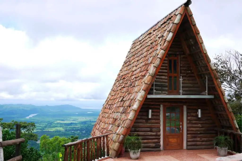 a-frame house overlooking valley is a place to put a tiny house on a foundation