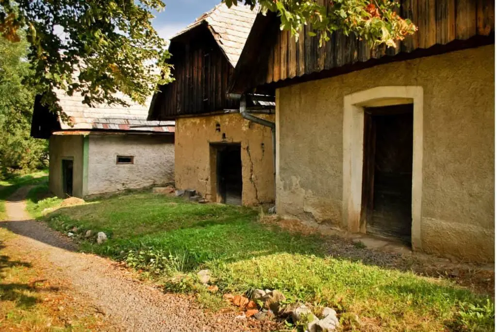 row of 3 old cob homes